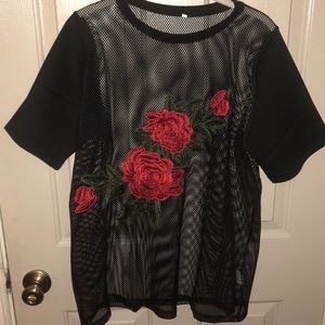 See-through Fishnet T-shirt with rose design.